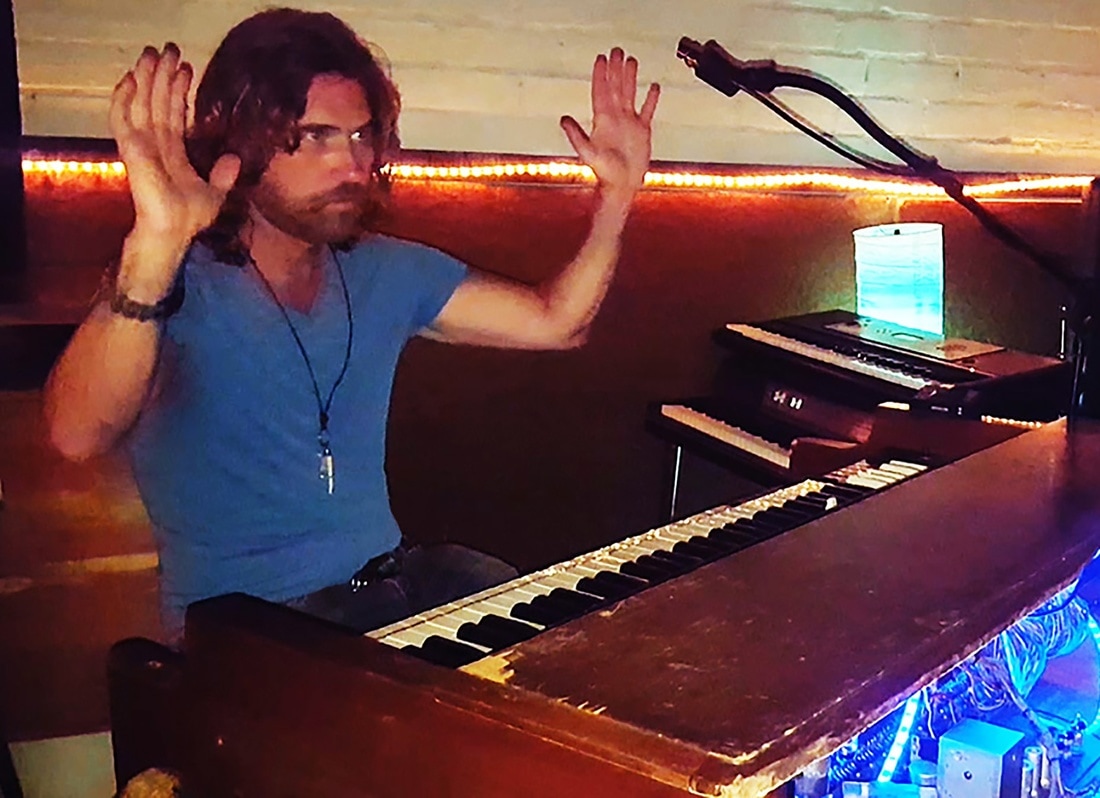 Mike Mangan on Hammond B3 Organ with Blue Lights playing telepathically not using hands 